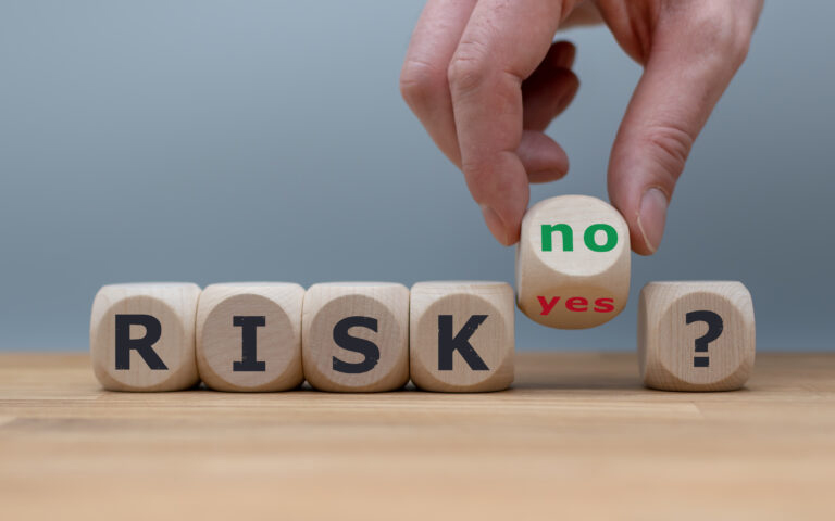 Taking a risk? Hand turns a dice and changes the word "yes" to "no".